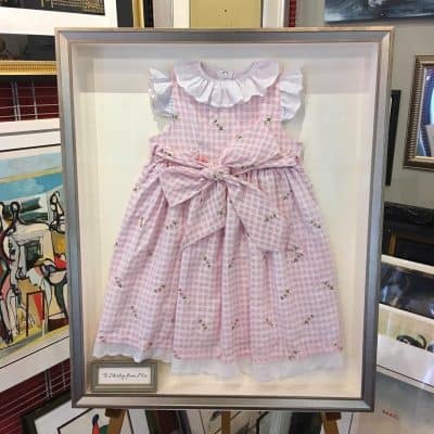 Shadow Box Frame of Baby Clothes